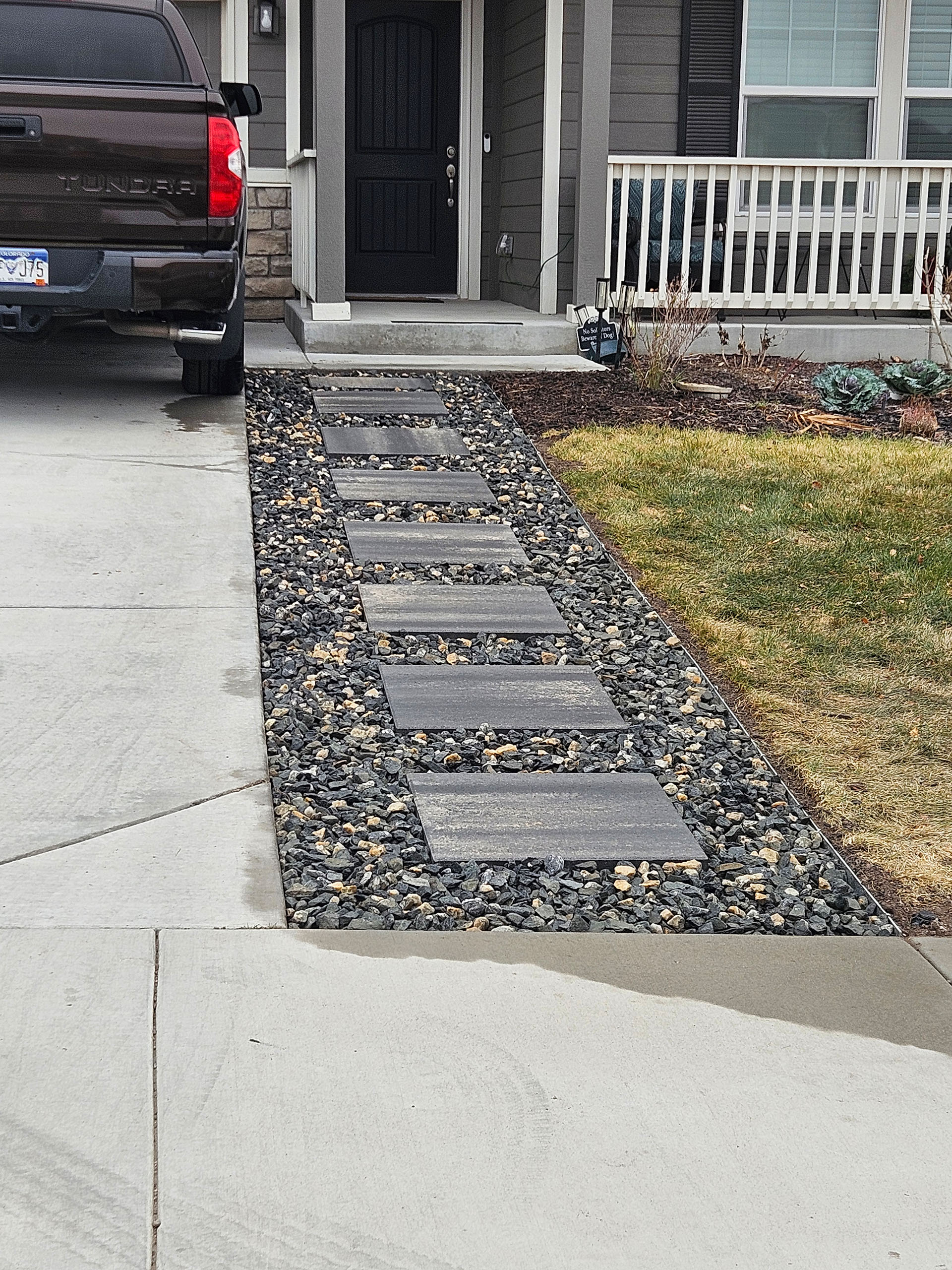 Modern stepping stone pathway with decorative gravel